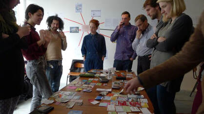 Artists at a discussion workshop